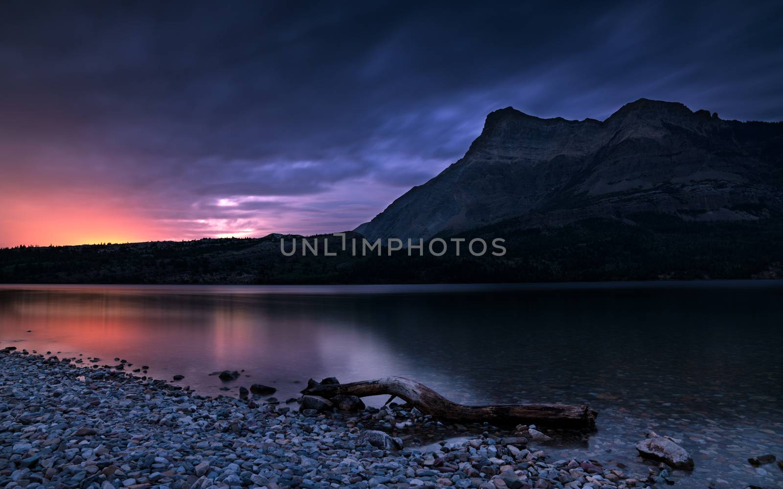 Panoramic image of the Waterton Lake at sunrise, Waterton Lakes National Park, Alberta, Canada