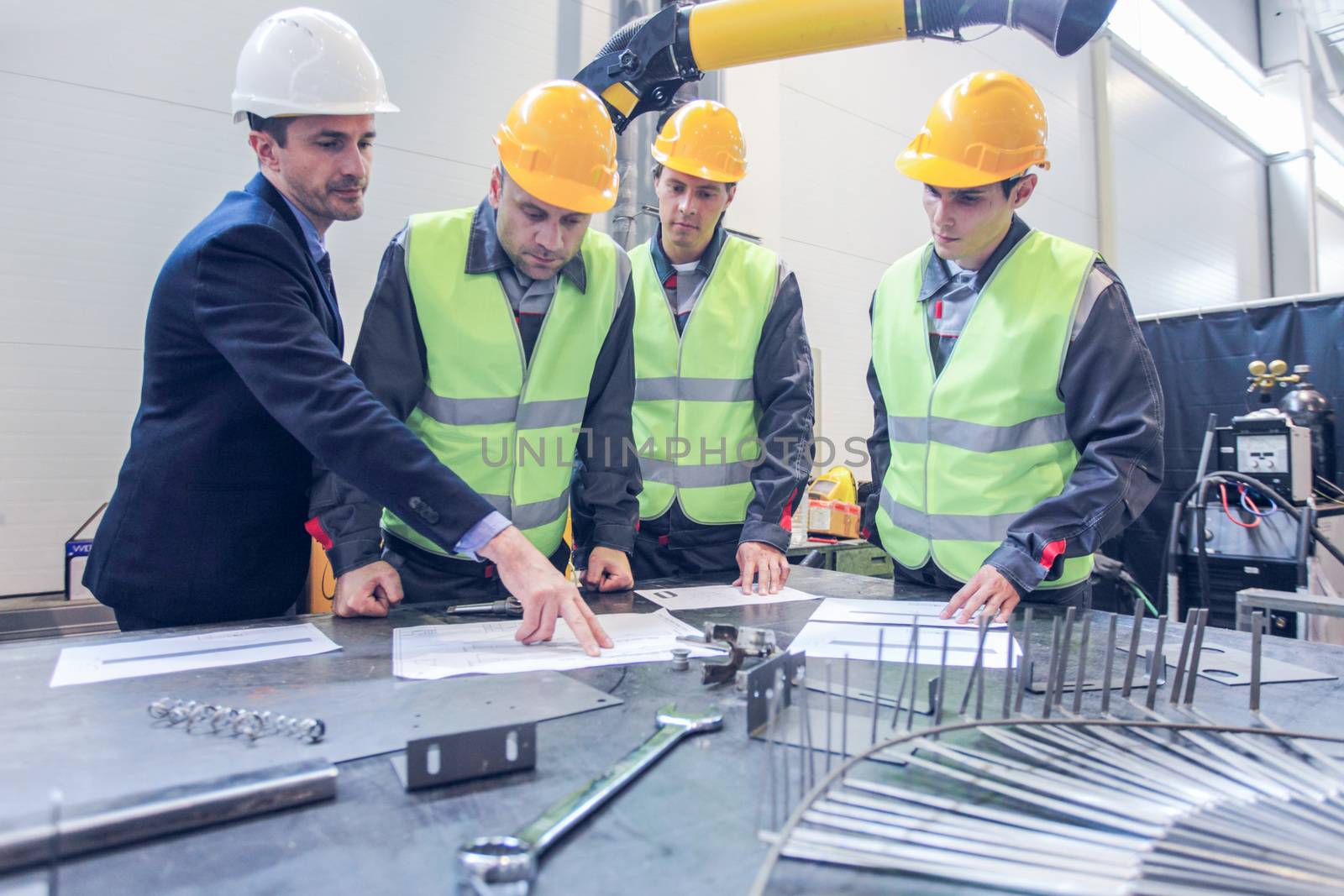 CNC machine shop with lathes, technicians and workers