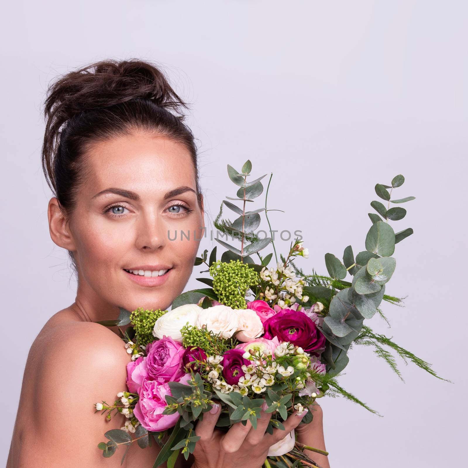 Beautiful woman with bouquet of flowers gift for valentines day
