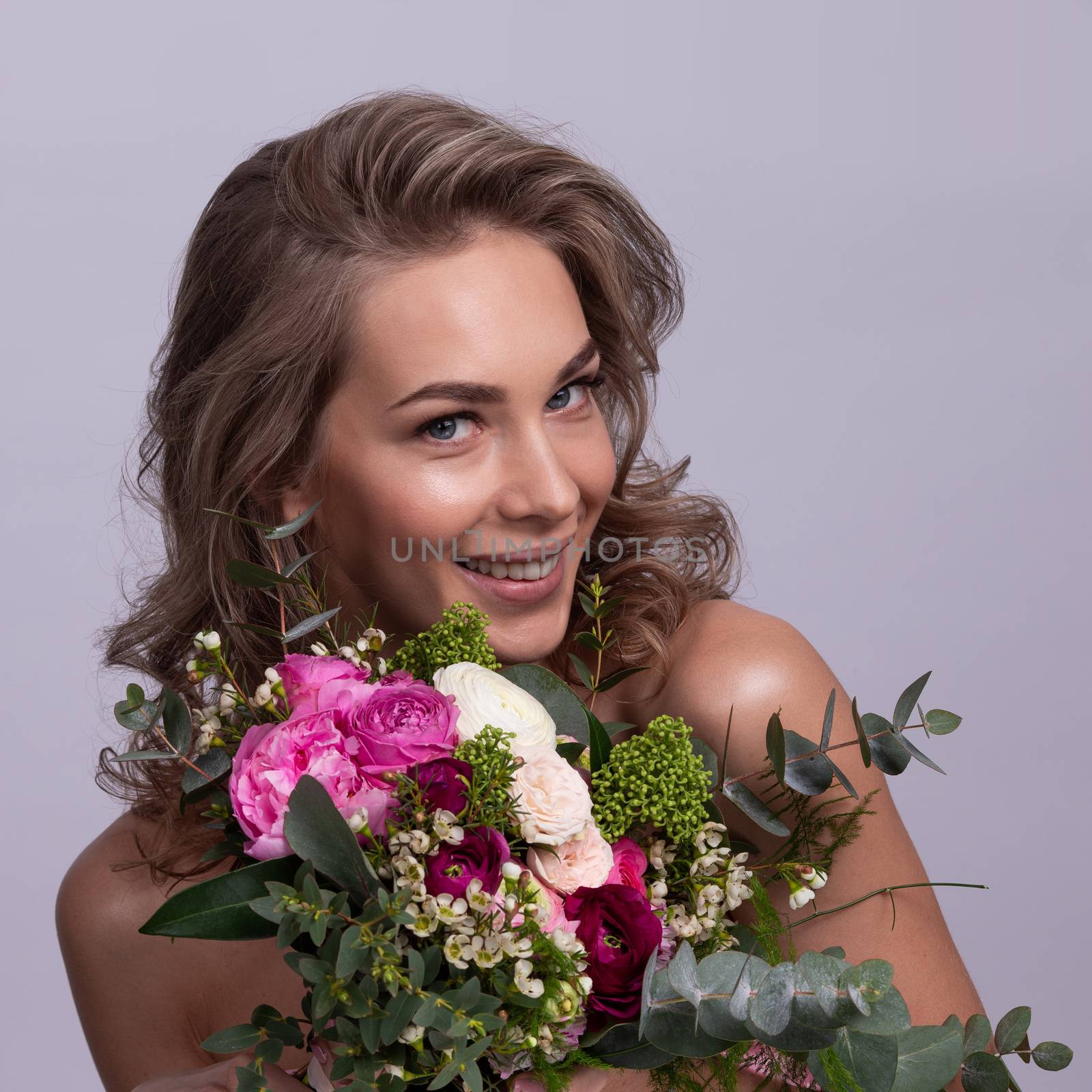 Beautiful woman with bouquet of flowers gift for valentines day