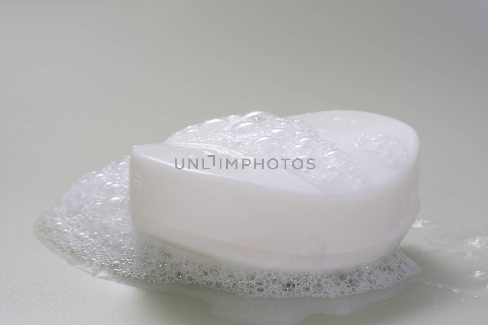 Nice white soap bar with foam by lanalanglois