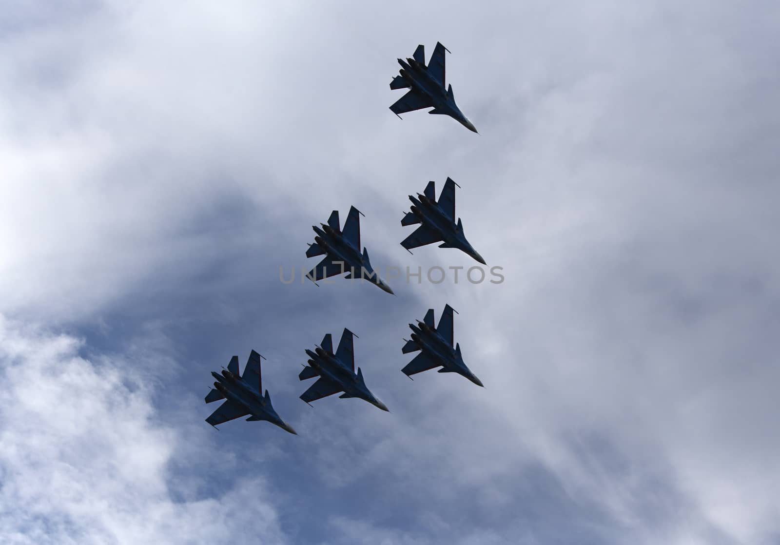 Silhouettes of russian fighter aircrafts in the sky. Russia, Moscow Airshow in July 2017
