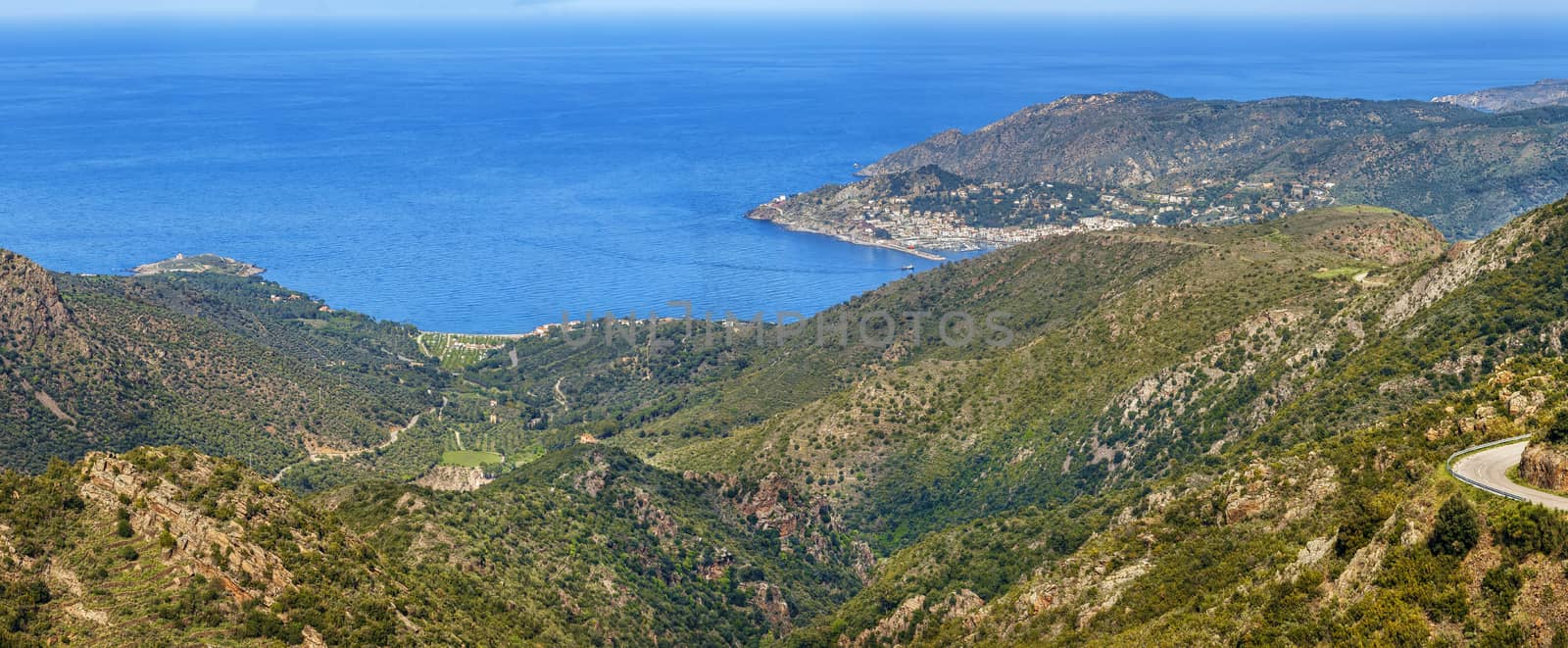 Panoramic view of mountain range Serra de Rodes with sea, Spain