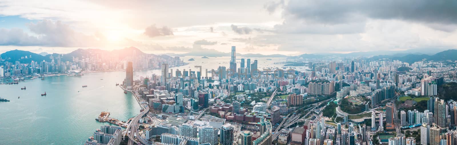 Top view aerial photo from flying drone of a HongKong Global City with development buildings, transportation, energy power infrastructure. Financial and business centers in developed China town