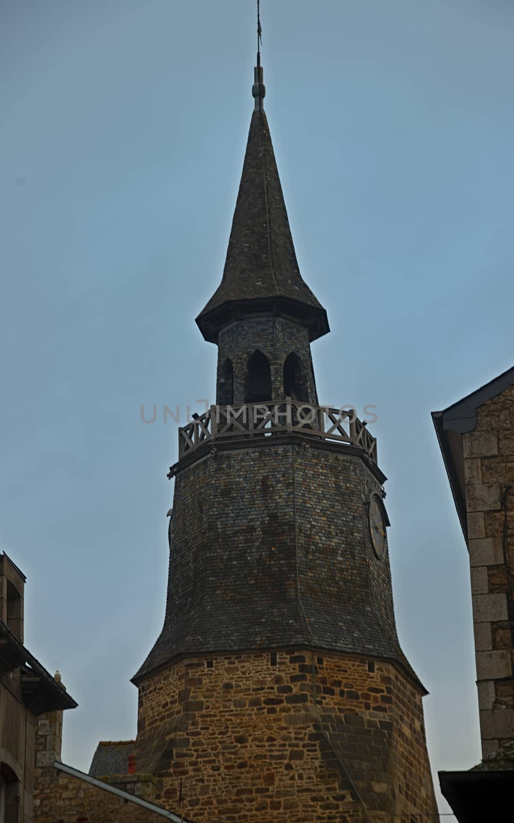 Old medieval stone clock tower in Dinan, France