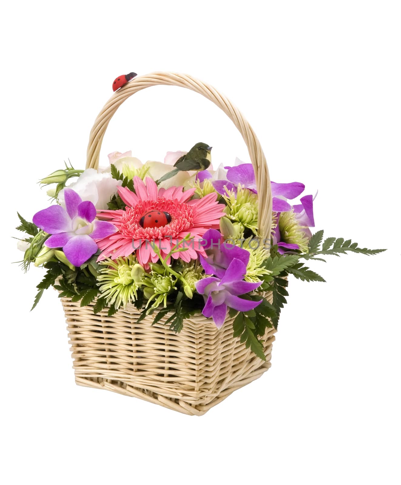 Bouquet of flowers in the basket, isolated on white.