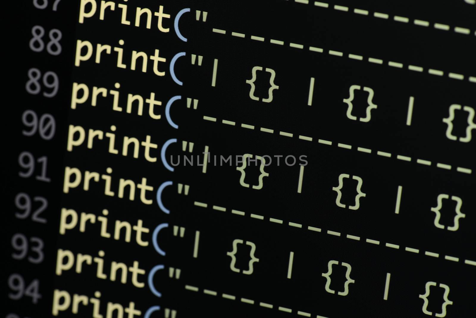 Real Python code developing screen. Programing workflow abstract algorithm concept. Lines of Python code visible under magnifying lens.