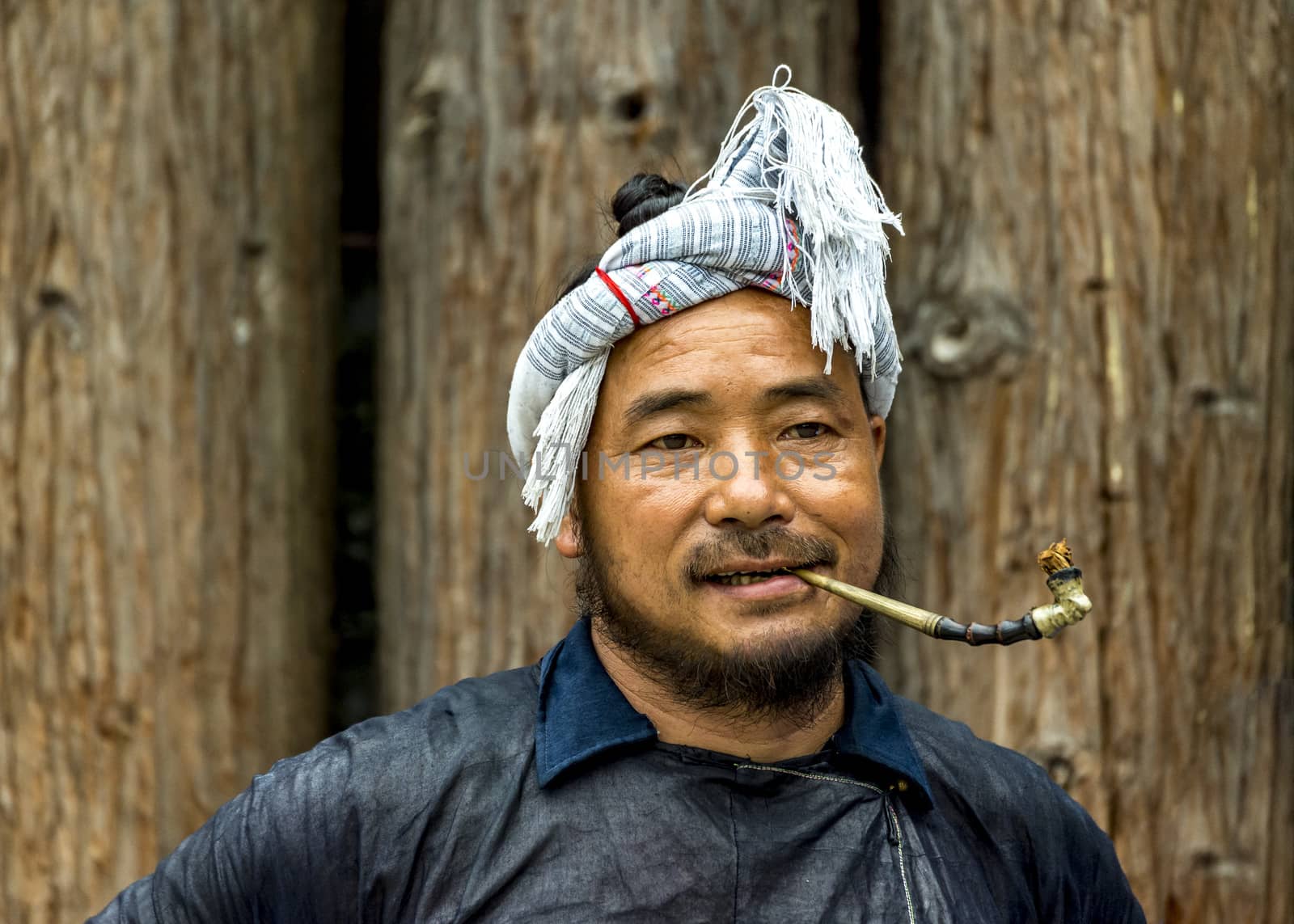 A Basha Miao Man in the Basha Miao Village of the  Congjiang county, Guizhou of China.