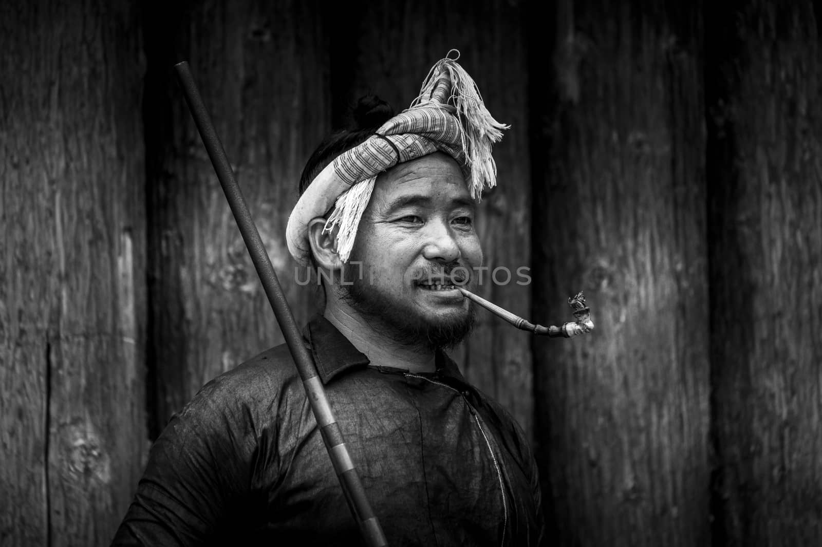 A Basha Miao Man in the Basha Miao Village of the  Congjiang county, Guizhou of China.