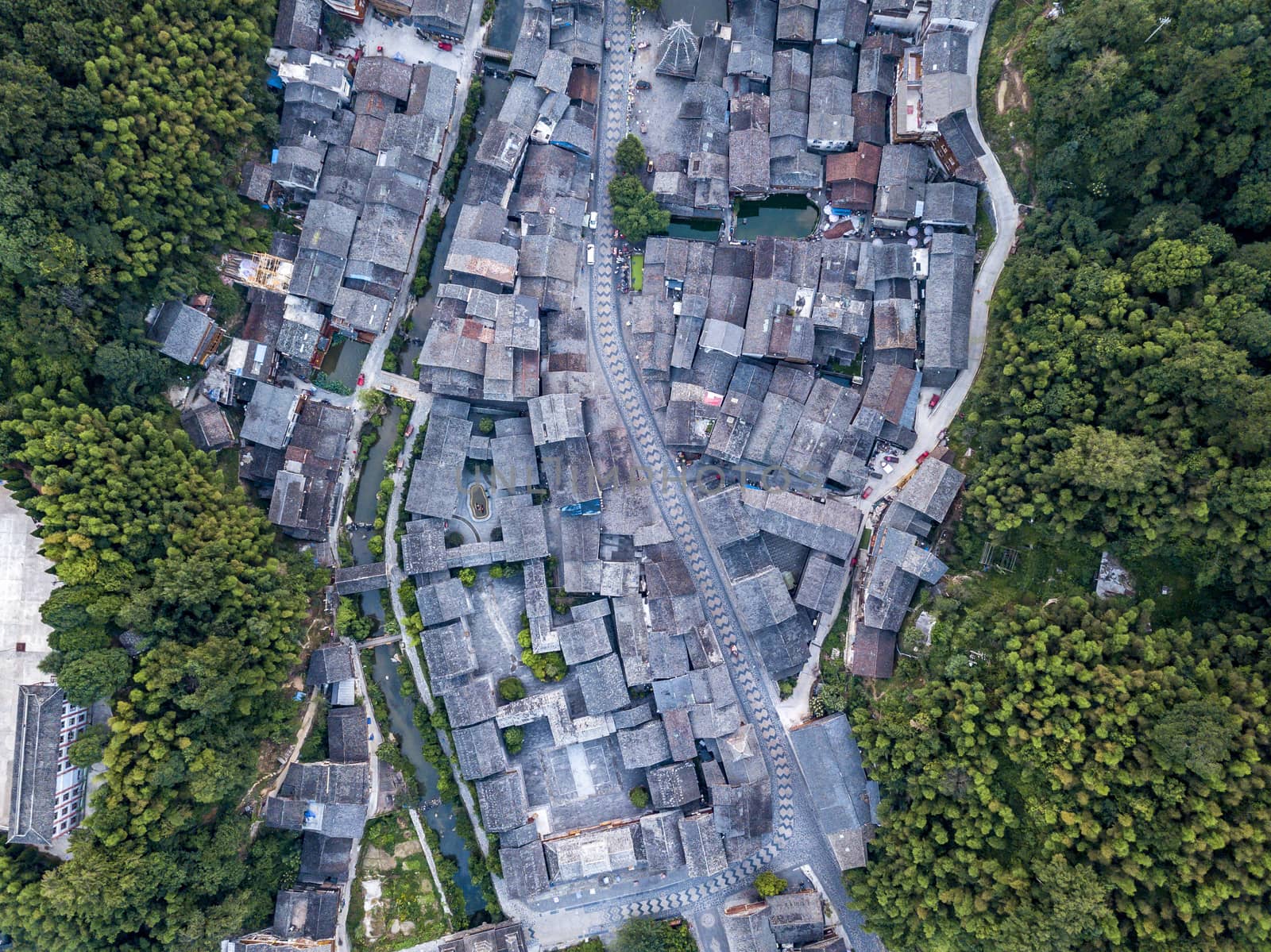 The bird's eye view of the traditional Dong village of Zhaoxing in Guizhou, China. The Chinese character in the photo is the name of Dong Village.