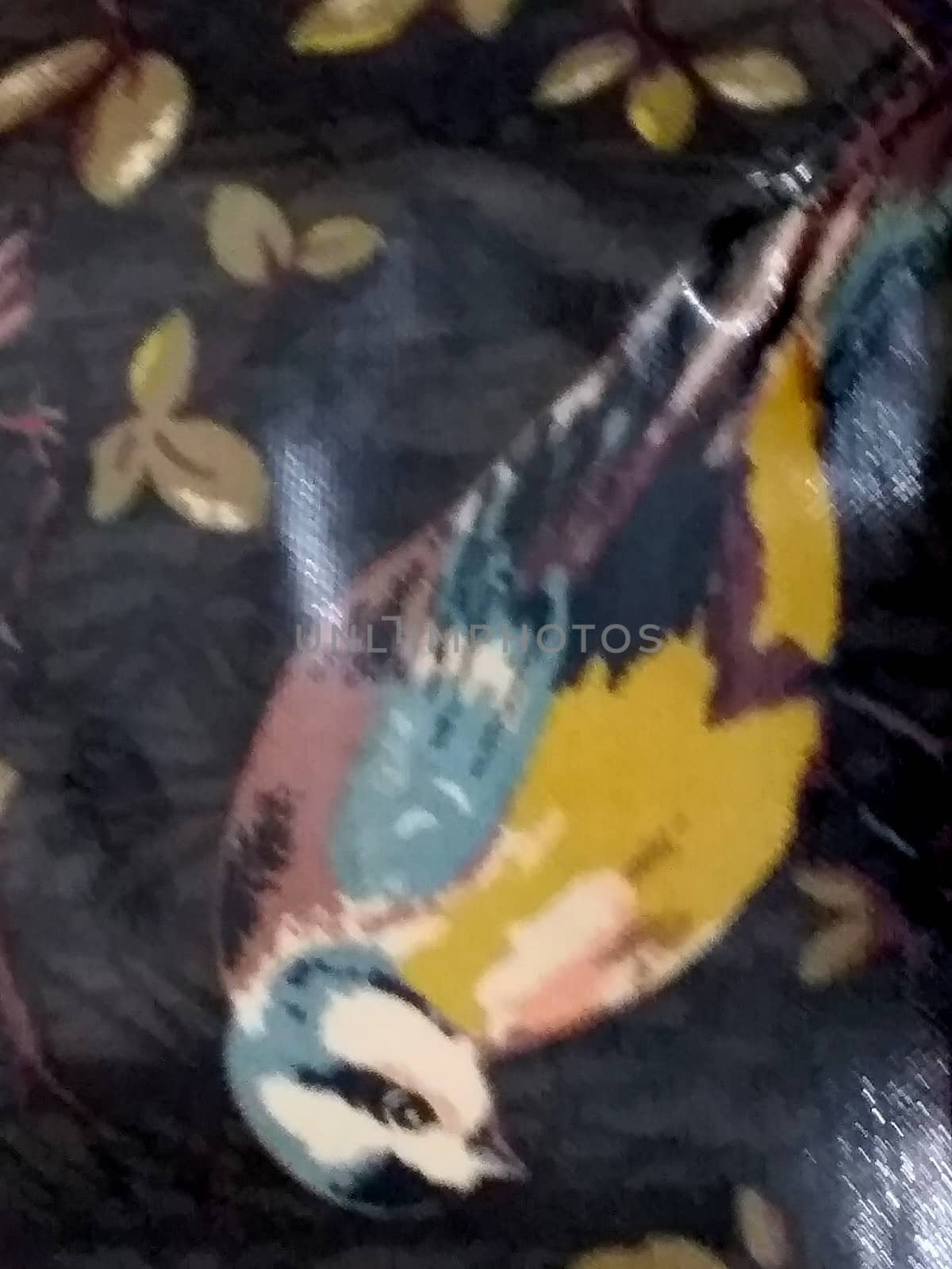 colorful bird on a branch textile and leather design by gswagh71