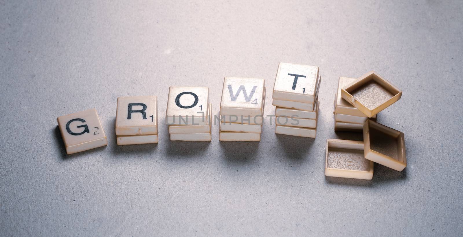 Growth tag label composed in scrabble letters