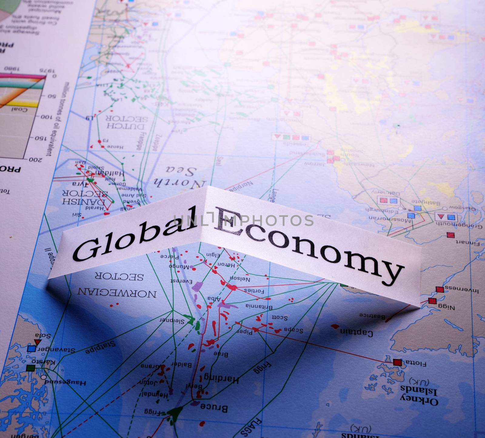Close up of global economy tag on a world map