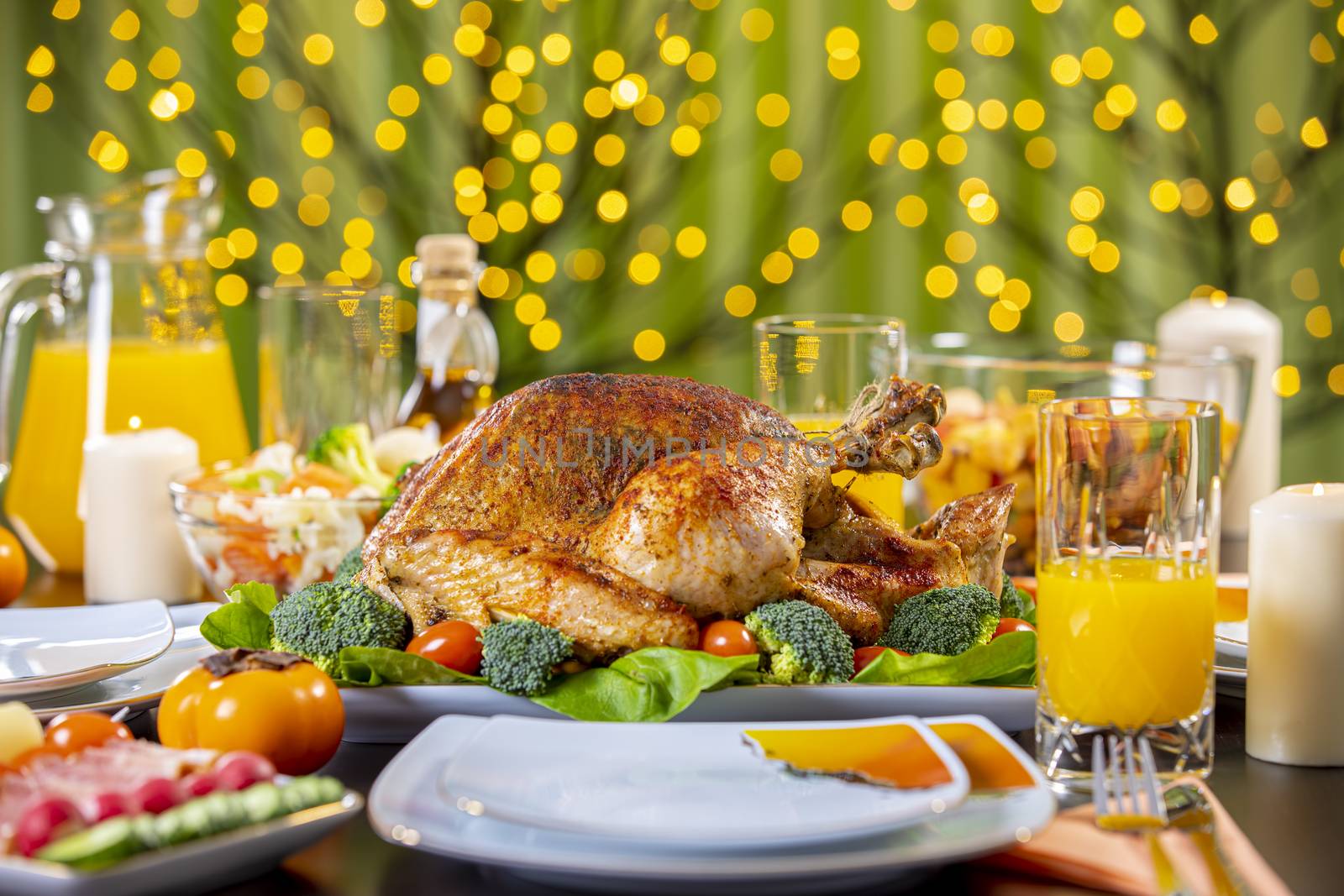 Celebrating Thanksgiving with roasted turkey on festive table. Roasted turkey on festive table for Thanksgiving celebration