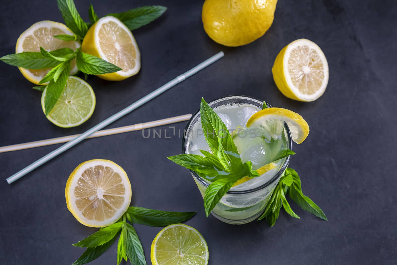 Top view of fresh lemonade with mint in glasses by manaemedia