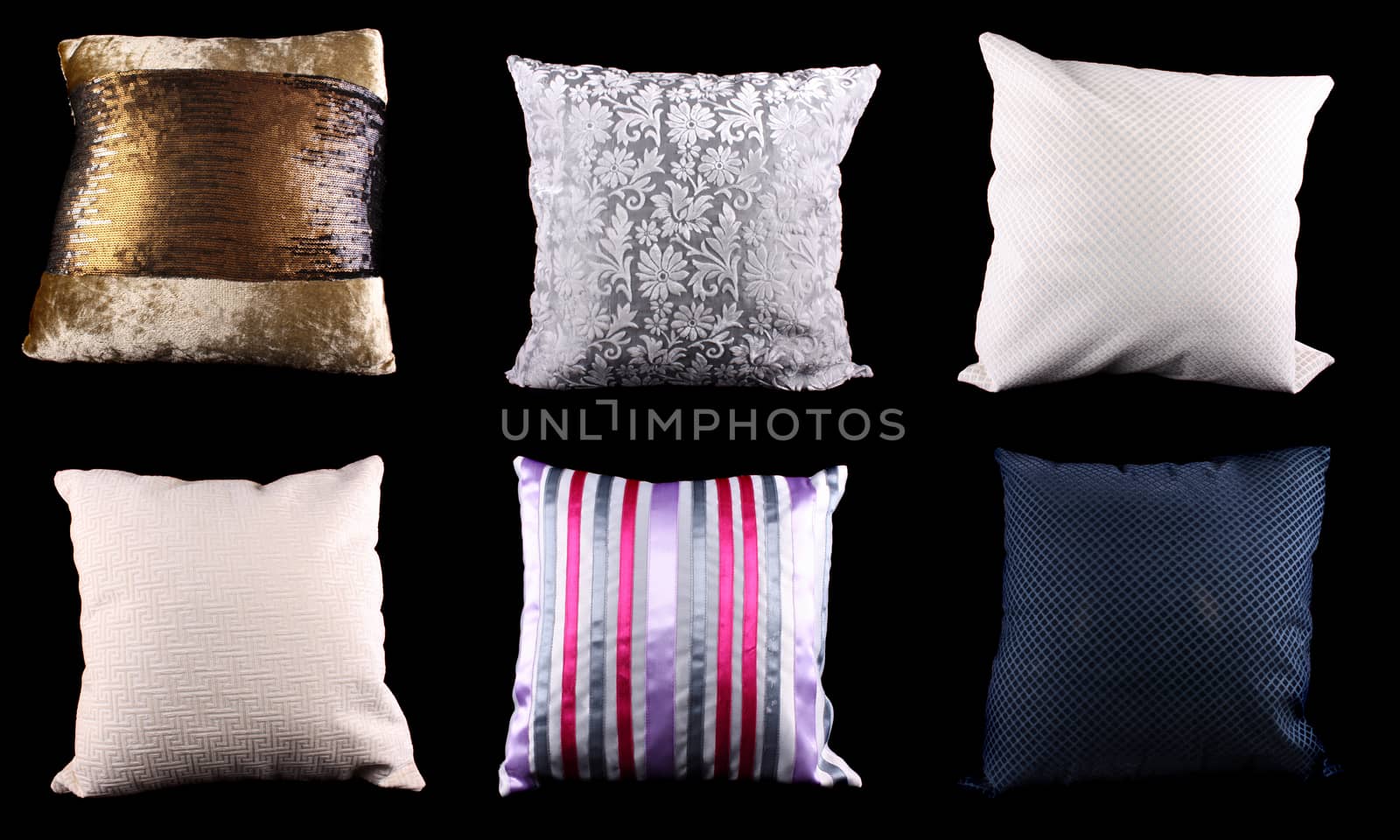 A set of square cushions made from different designs and material, on black studio background.