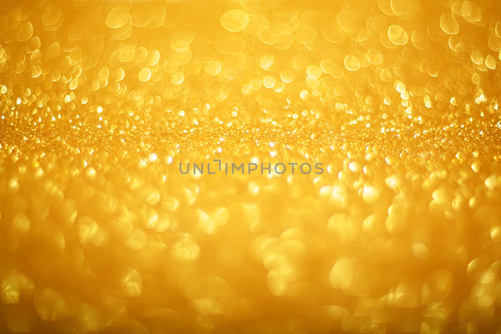 Abstract gold bokeh background of glowing lights, party, holiday, christmas