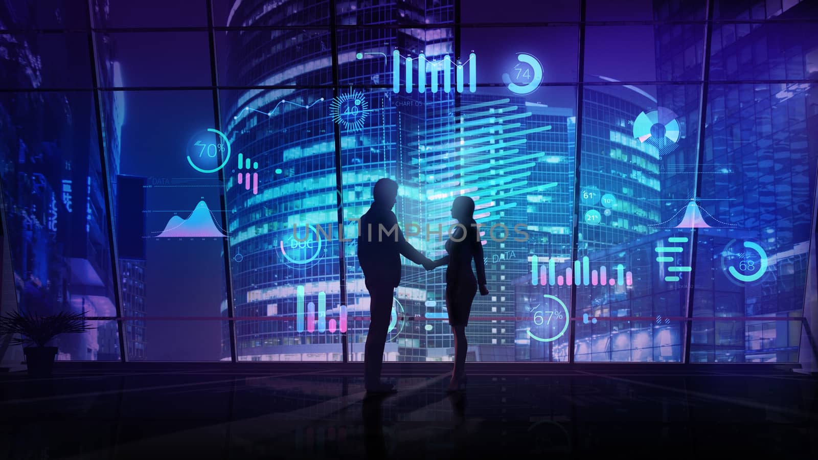 Silhouettes of man and woman at the time of a handshake on the background of infographics and evening illumination of a business center.