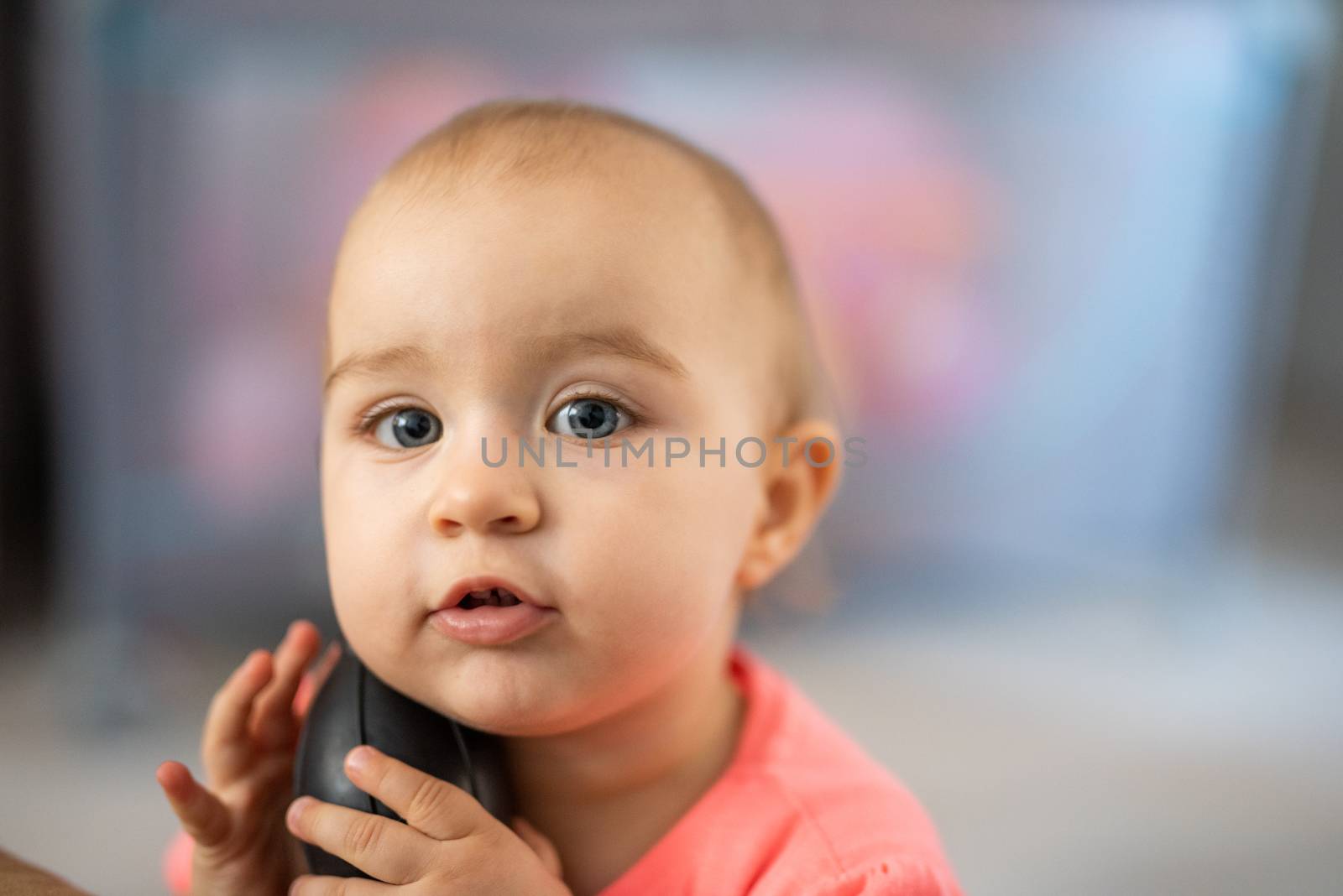 Portrait of adorable baby girl. Childhood. Authentic image