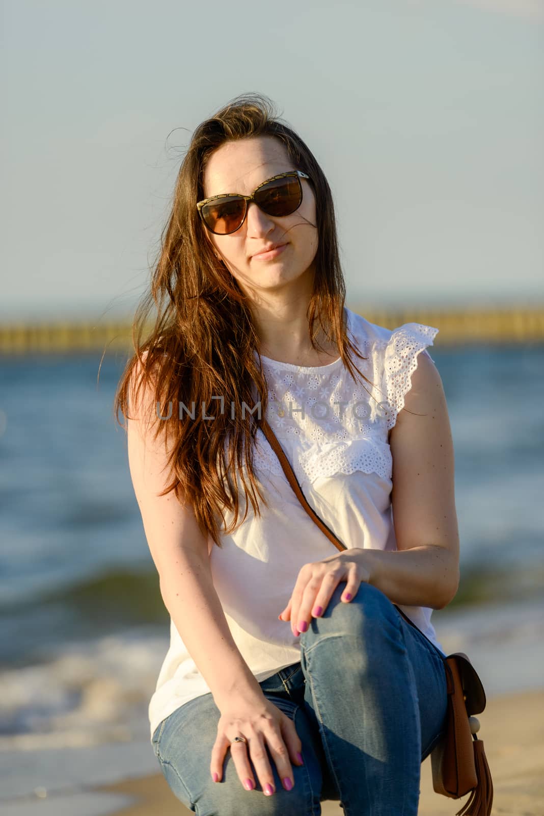 Portrait of smiling young woman enjoying the time.