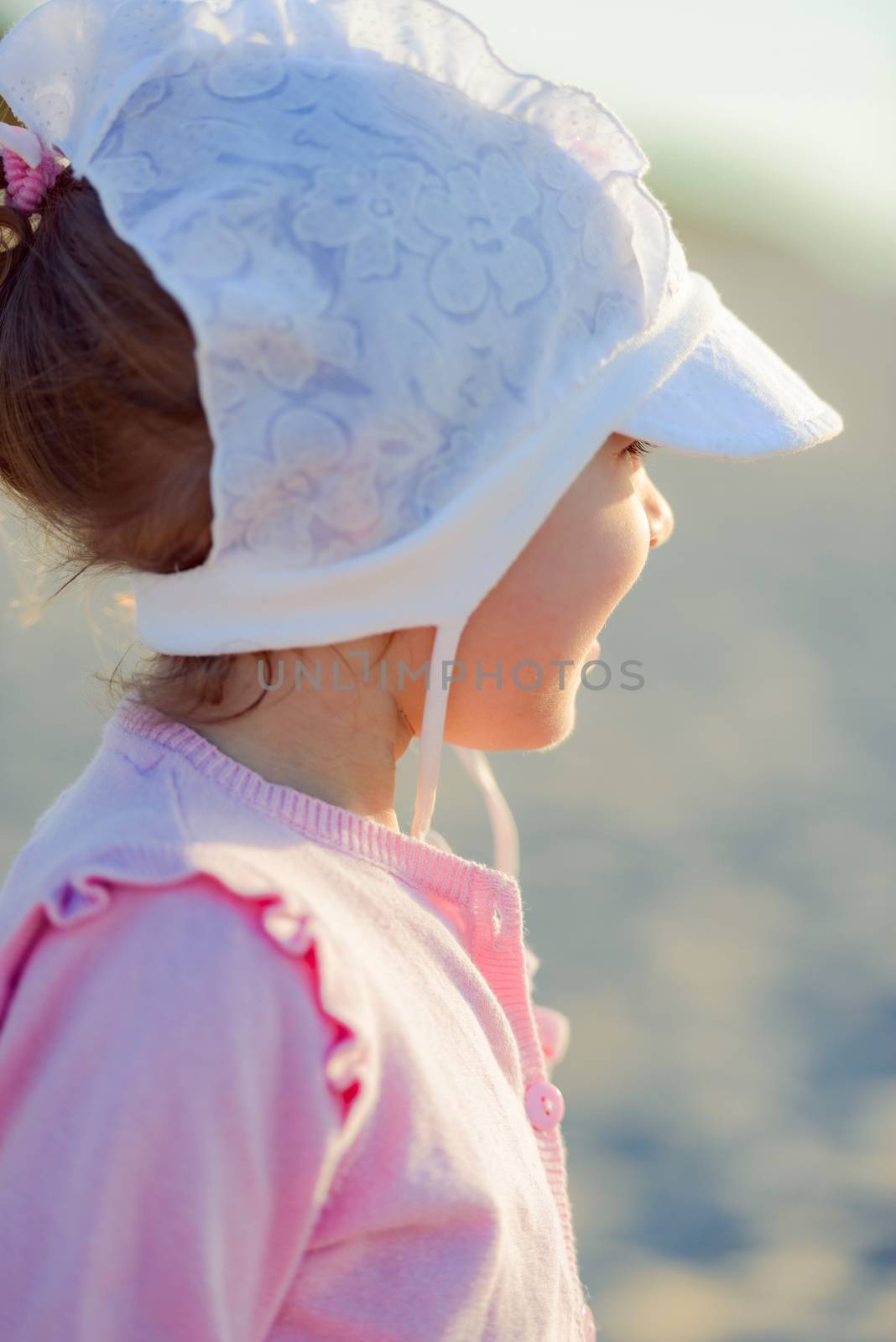 Portrait of adorable baby girl. Childhood. Authentic image