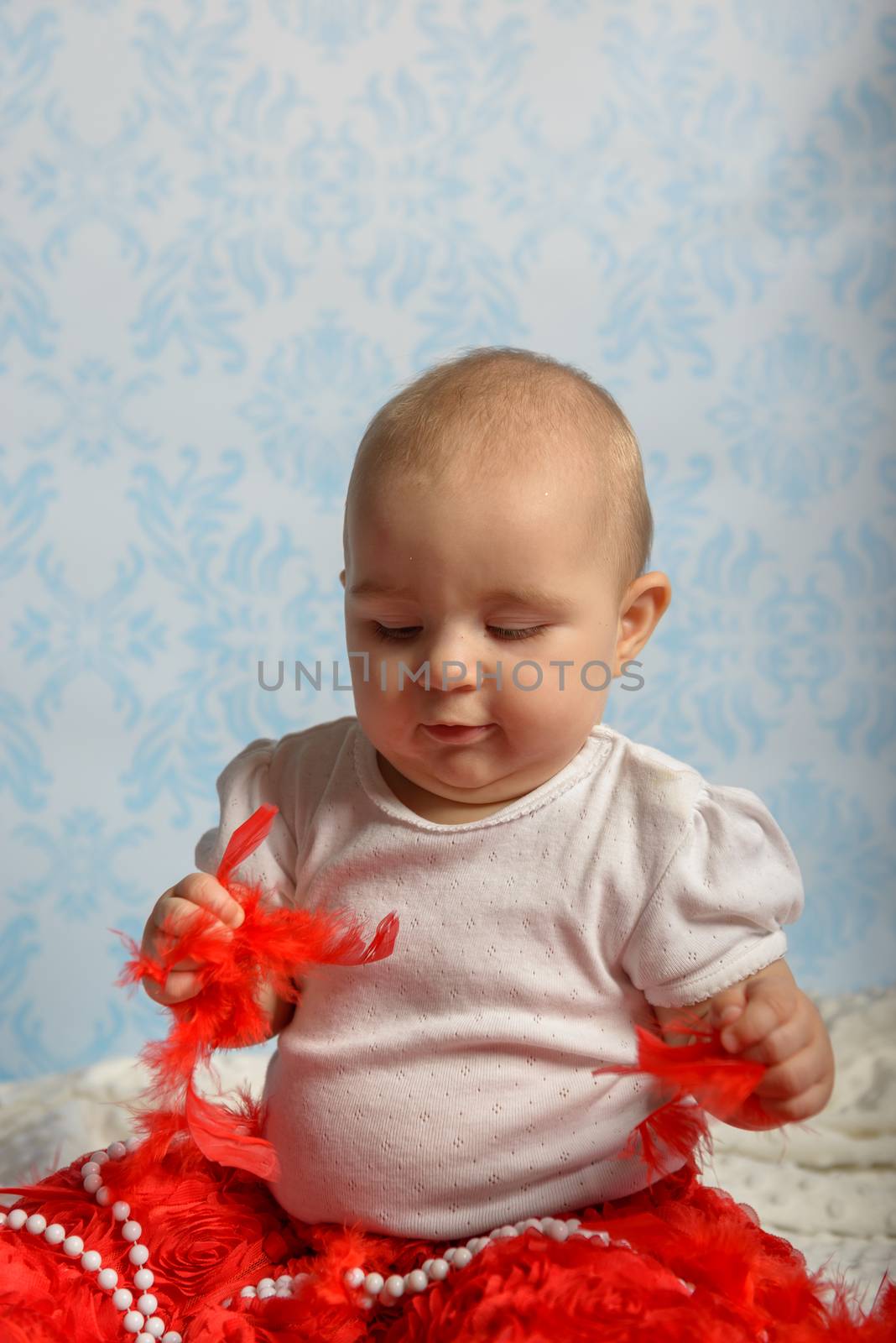Portrait of adorable baby girl. Childhood. Authentic image