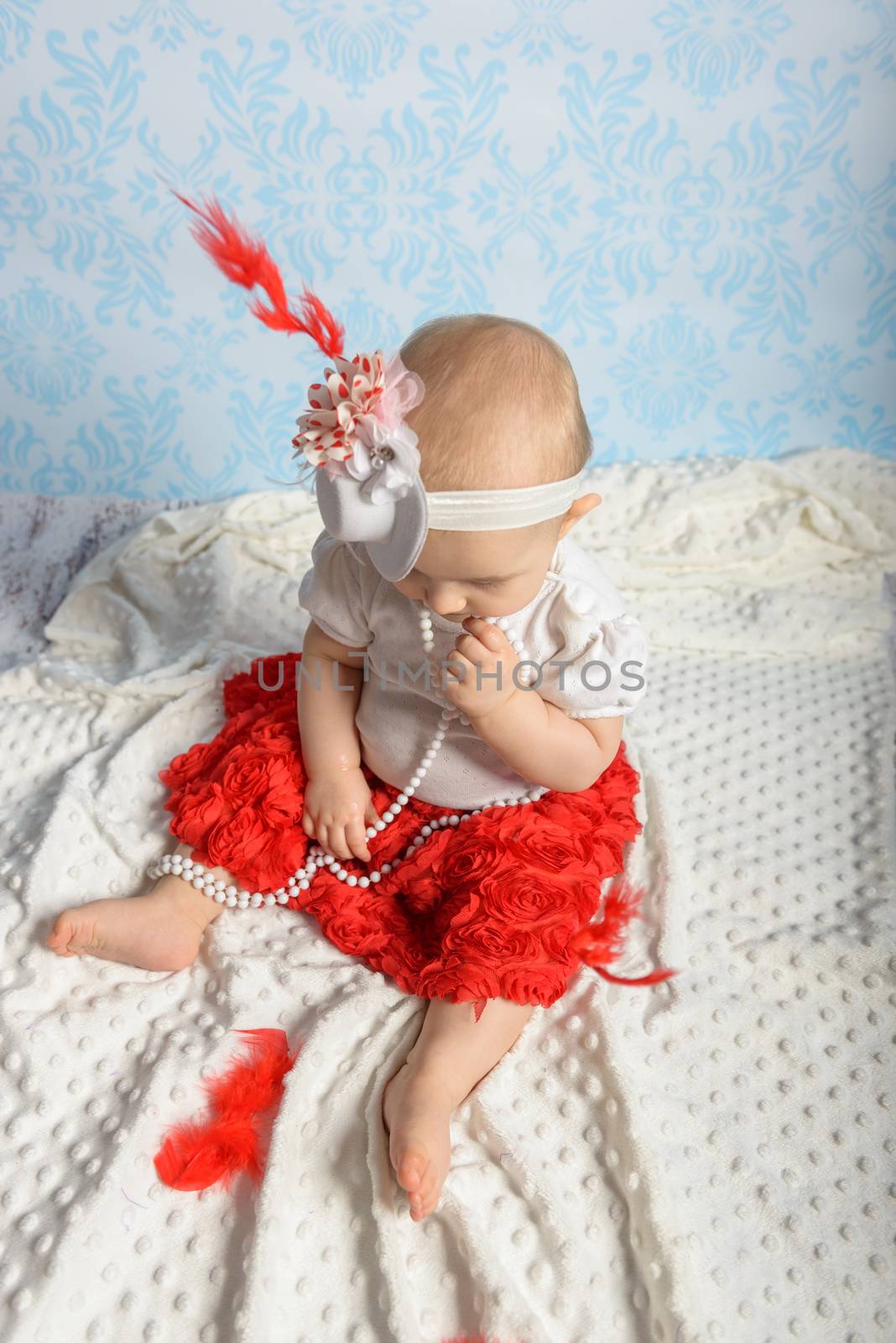 Portrait of adorable baby girl. Childhood. Authentic image