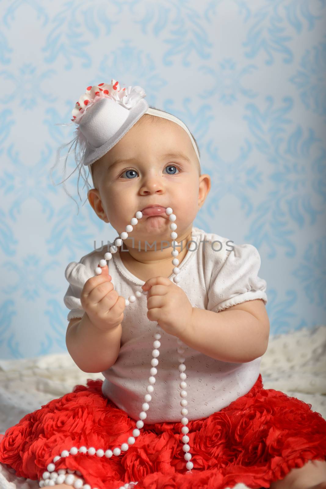 Portrait of adorable baby girl. Childhood. Authentic image