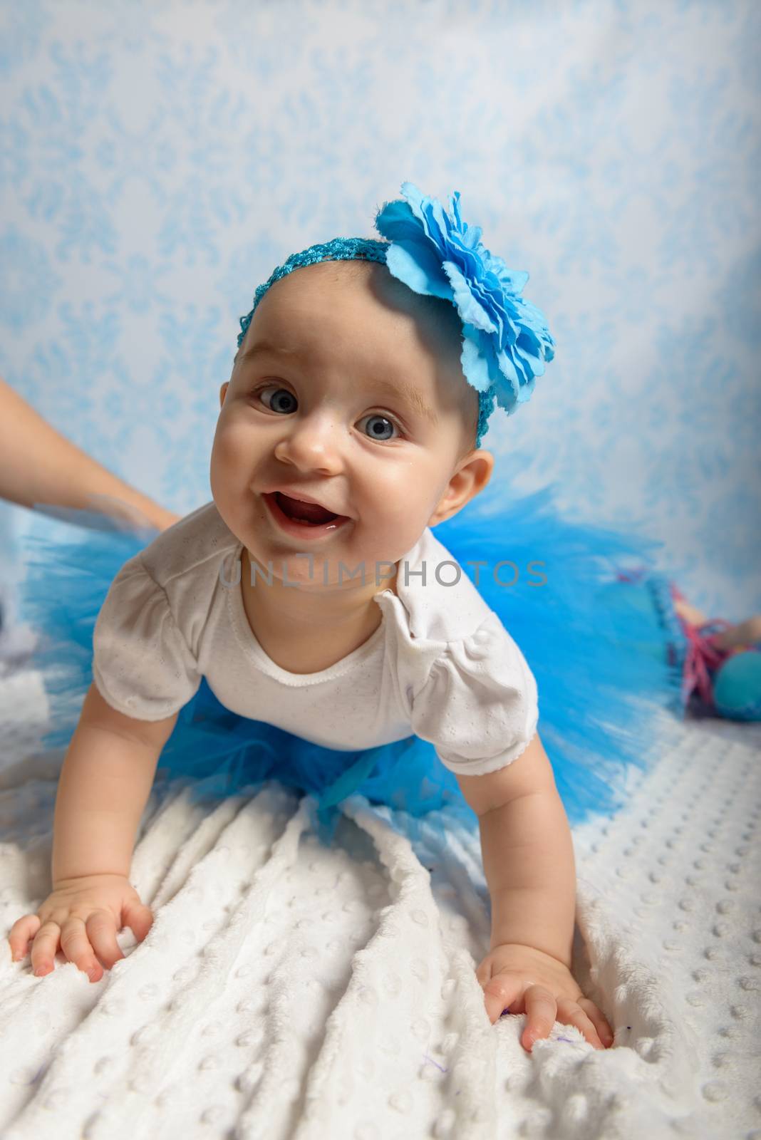 Portrait of adorable baby girl. Childhood. Authentic image