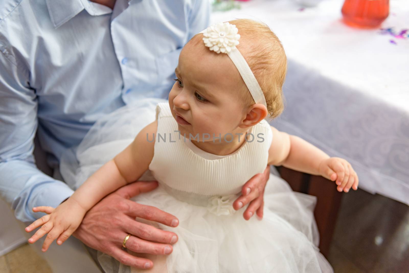 Portrait of adorable baby girl. Childhood. Authentic image