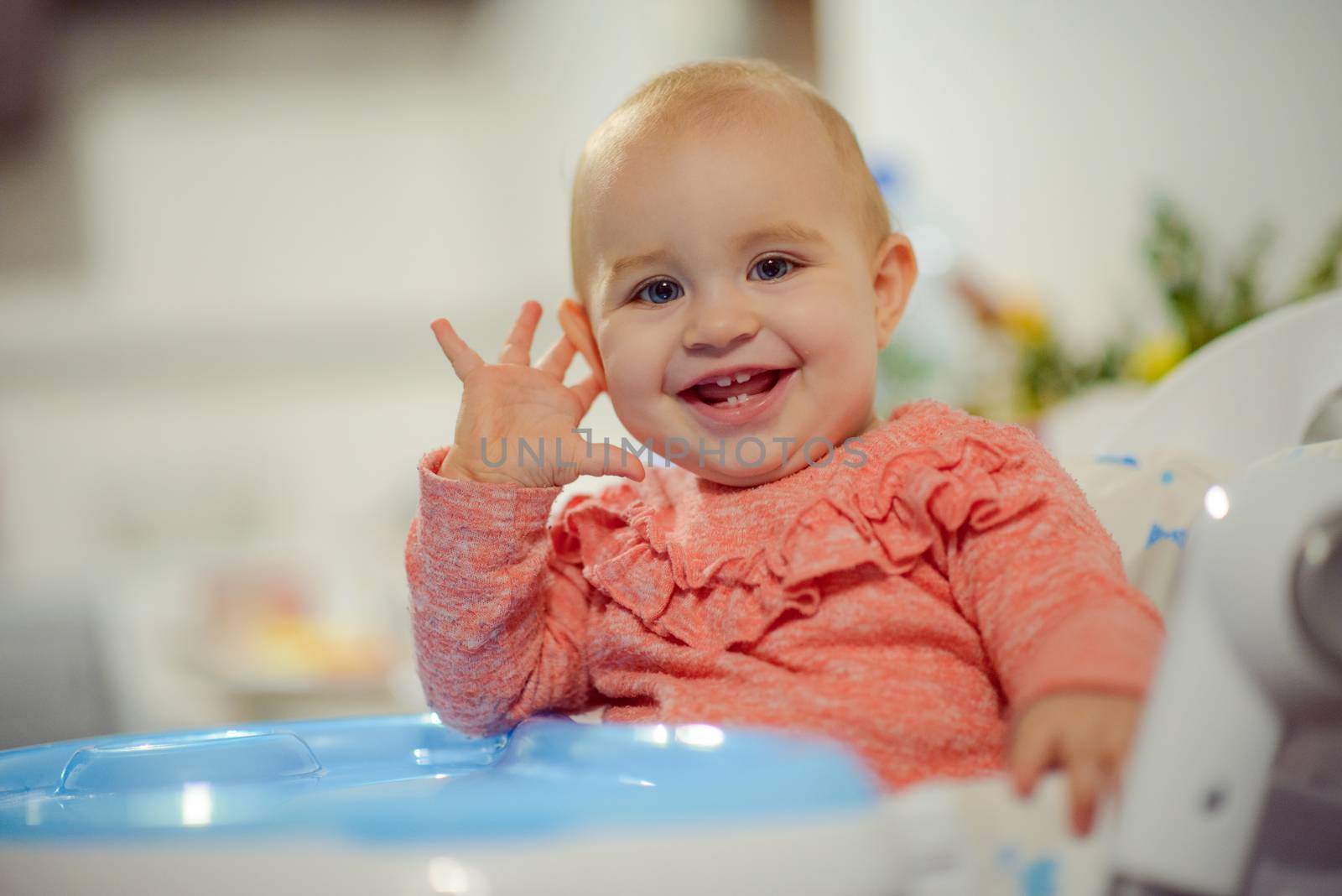 Portrait of adorable baby girl. Childhood. Authentic image