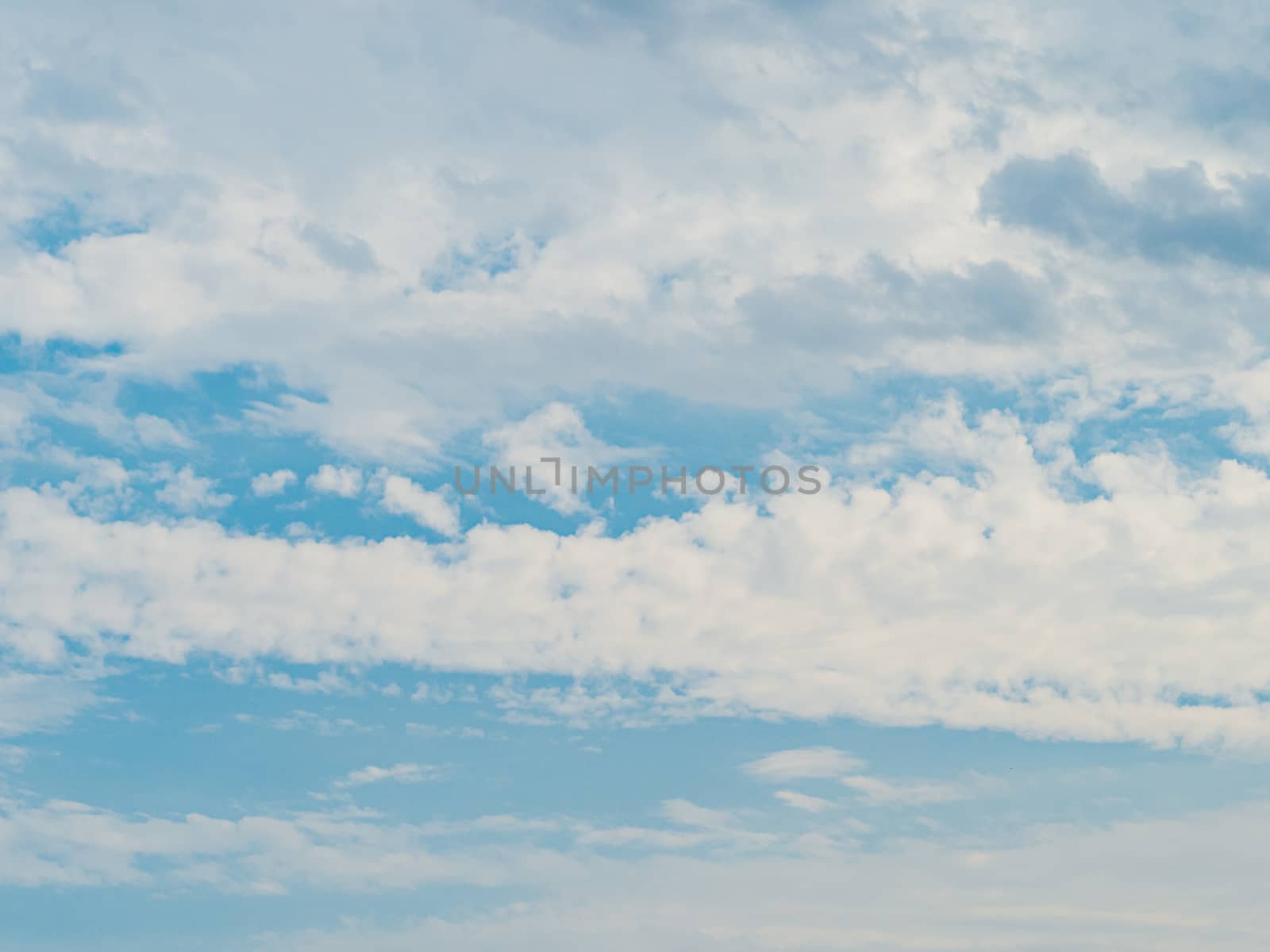 Blue sky with clouds. Cloudscape with copy space for text or design