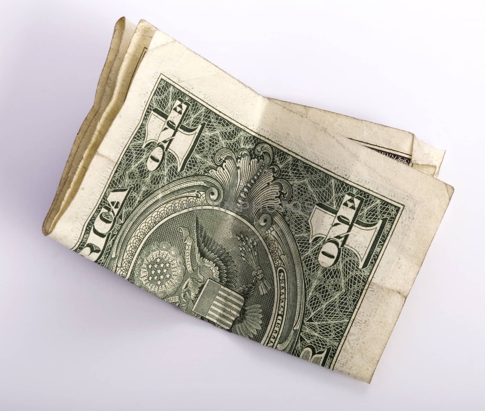 one crumpled one dollar banknote, isolated on white background.