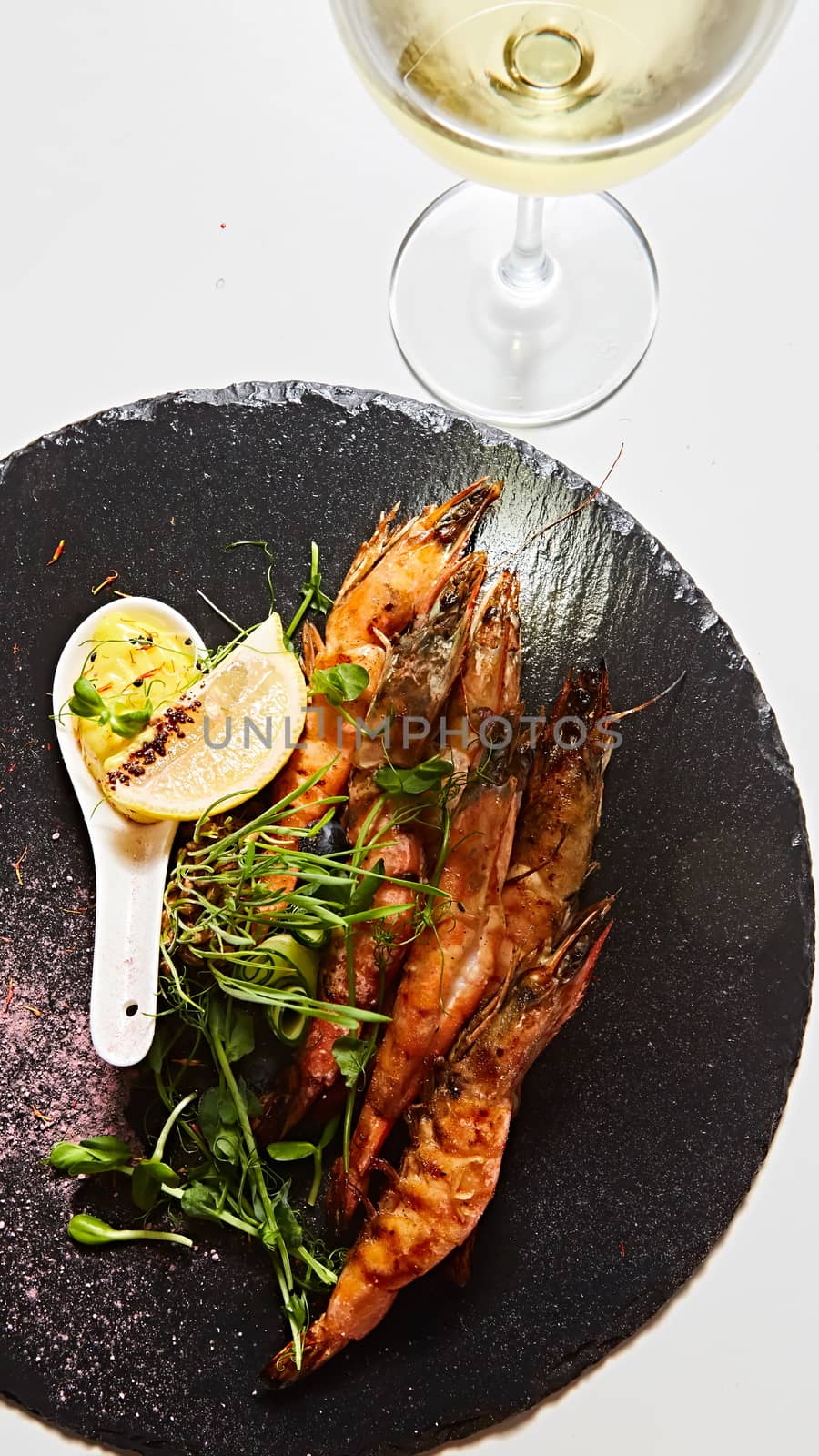 Grilled shrimp skewers. Seafood, shelfish. Shrimps Prawns skewers with herbs, garlic and lemon. Barbecue srimps prawns.