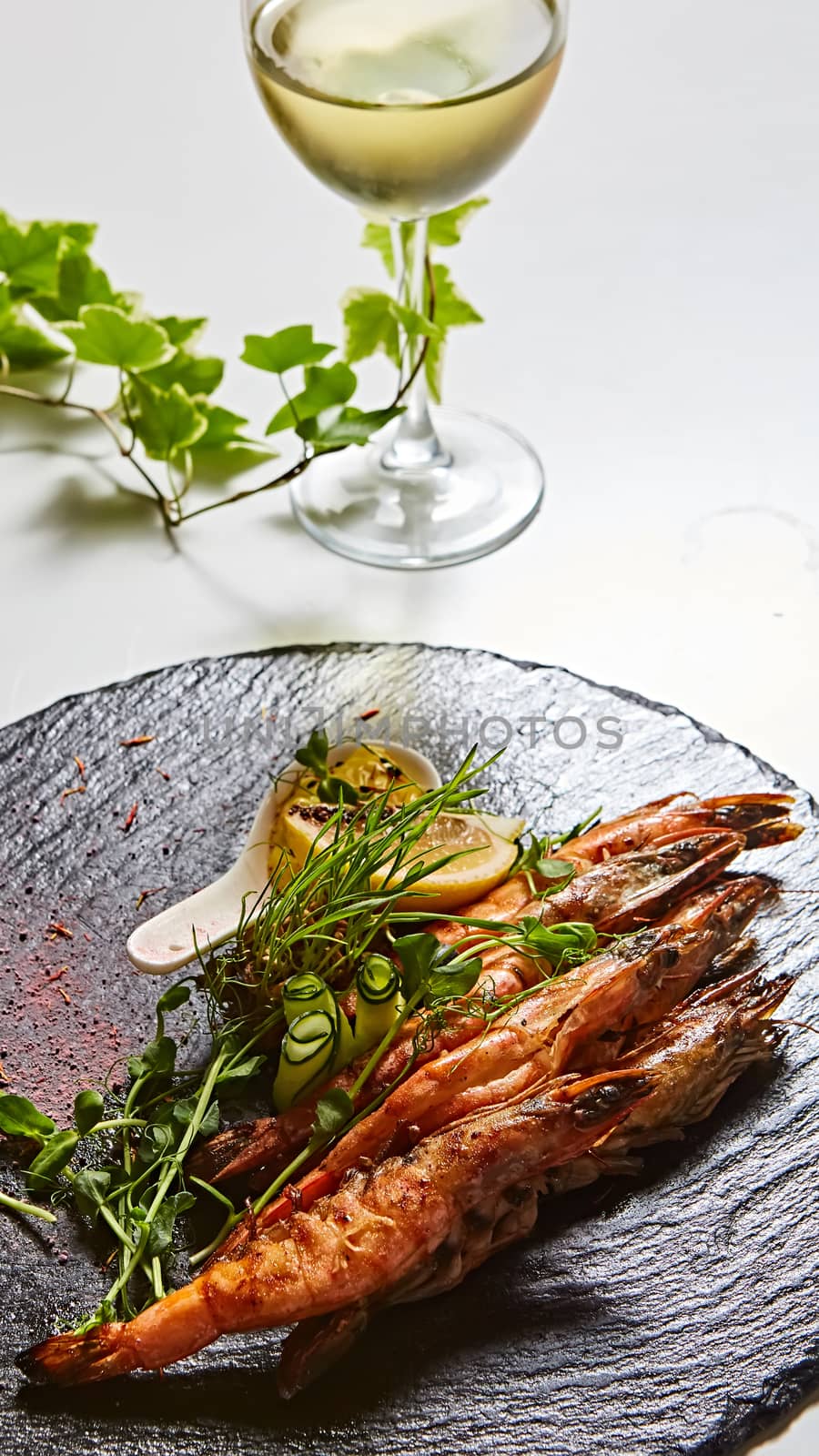 Grilled shrimp skewers. Seafood, shelfish. Shrimps Prawns skewers with herbs, garlic and lemon. by sarymsakov