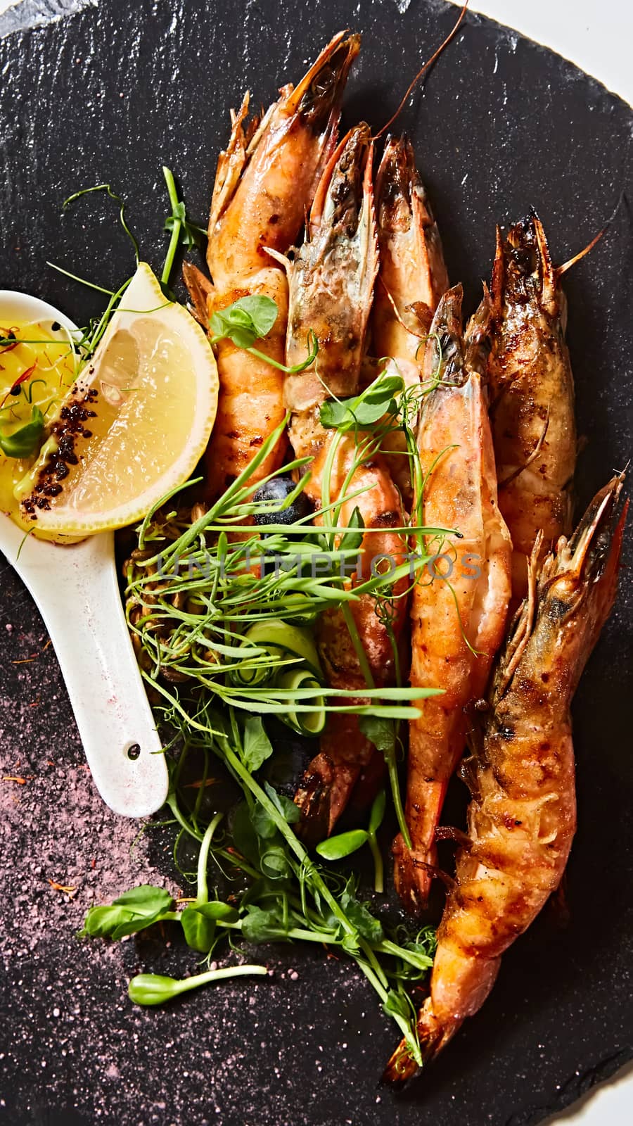 Grilled shrimp skewers. Seafood, shelfish. Shrimps Prawns skewers with herbs, garlic and lemon. Barbecue srimps prawns.