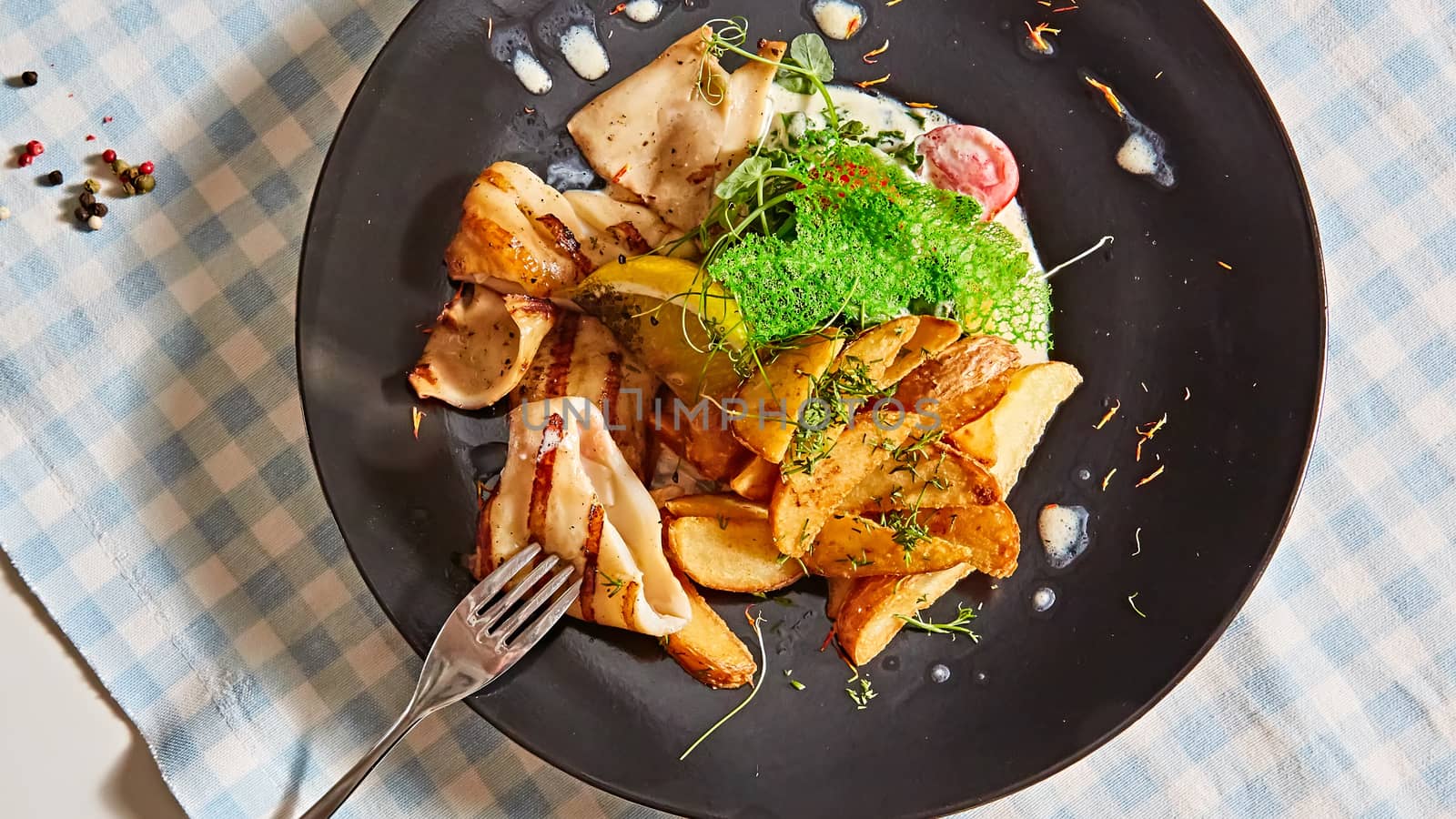 Grilled squid with salad. Shallow dof