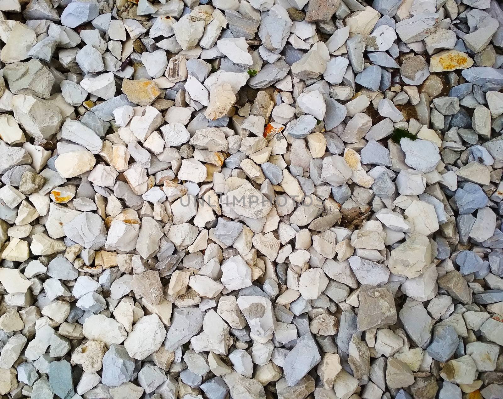 
Texture of small stone rubble of different shapes and colors.