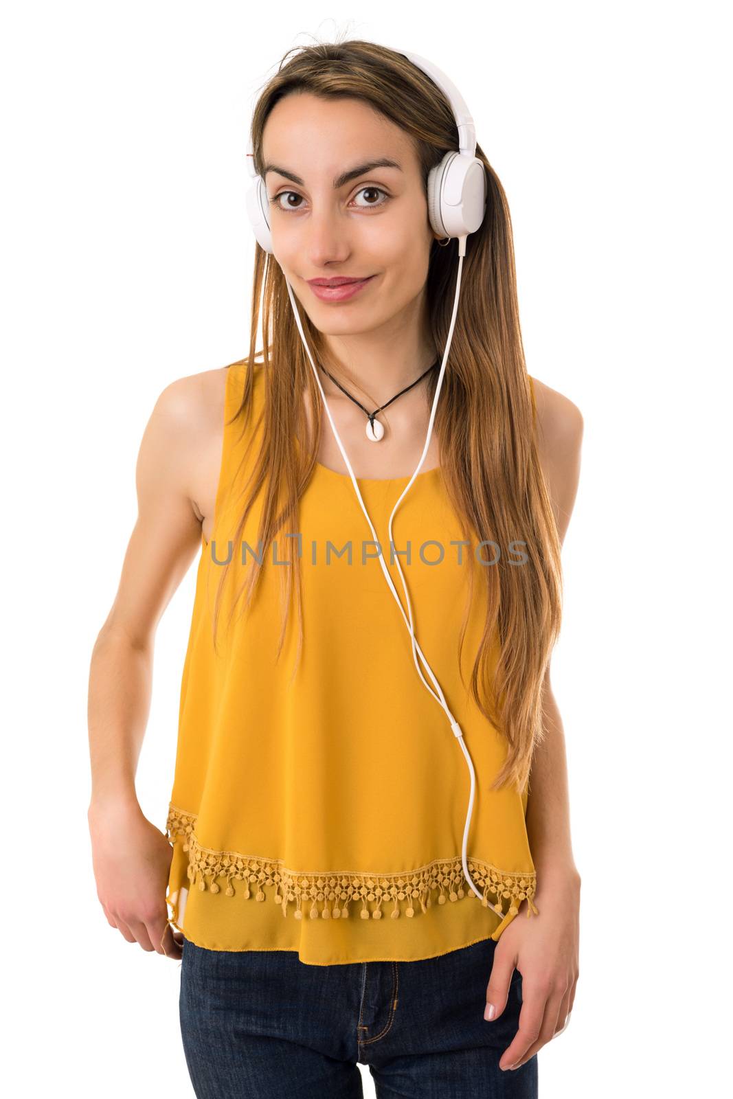 Beautiful young woman listen music with headphones, isolated on white