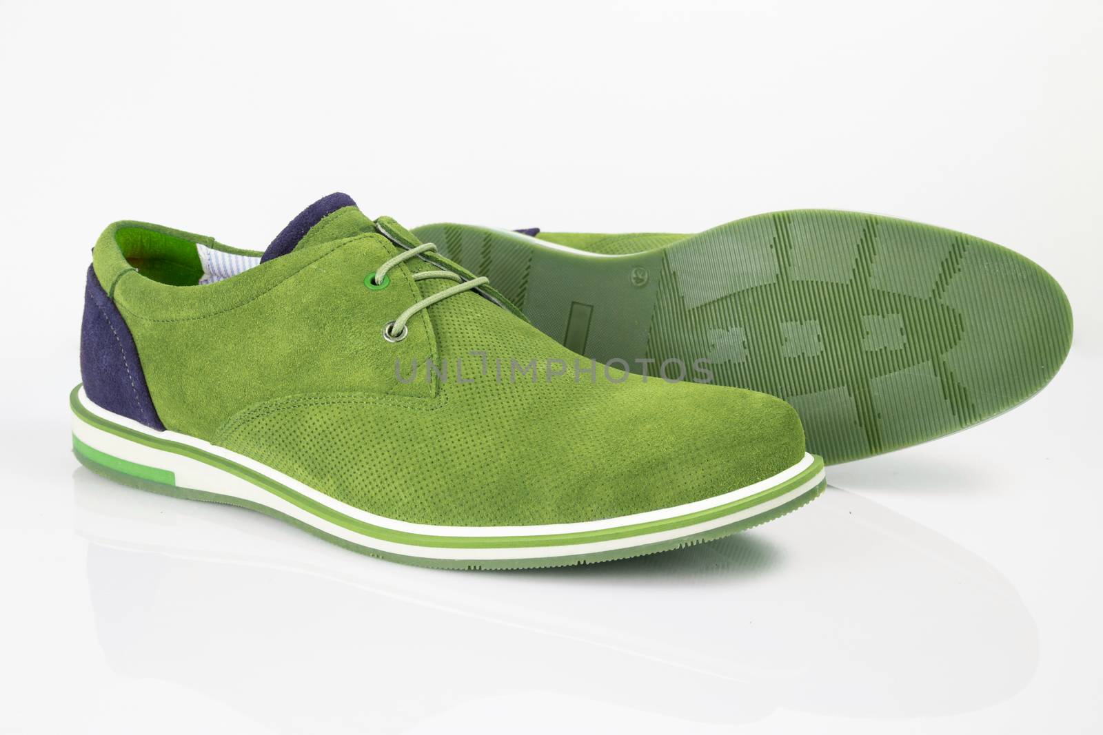Male green leather elegant shoes on white background, isolated product. by GeorgeVieiraSilva