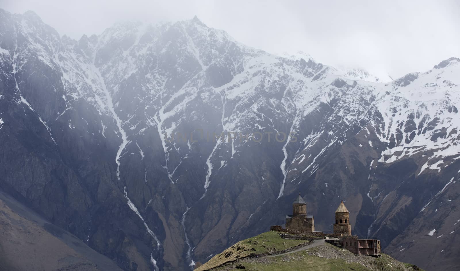 14th century Holy Trinity Church (Tsminda Sameba) near Mount Kazbek in Georgia