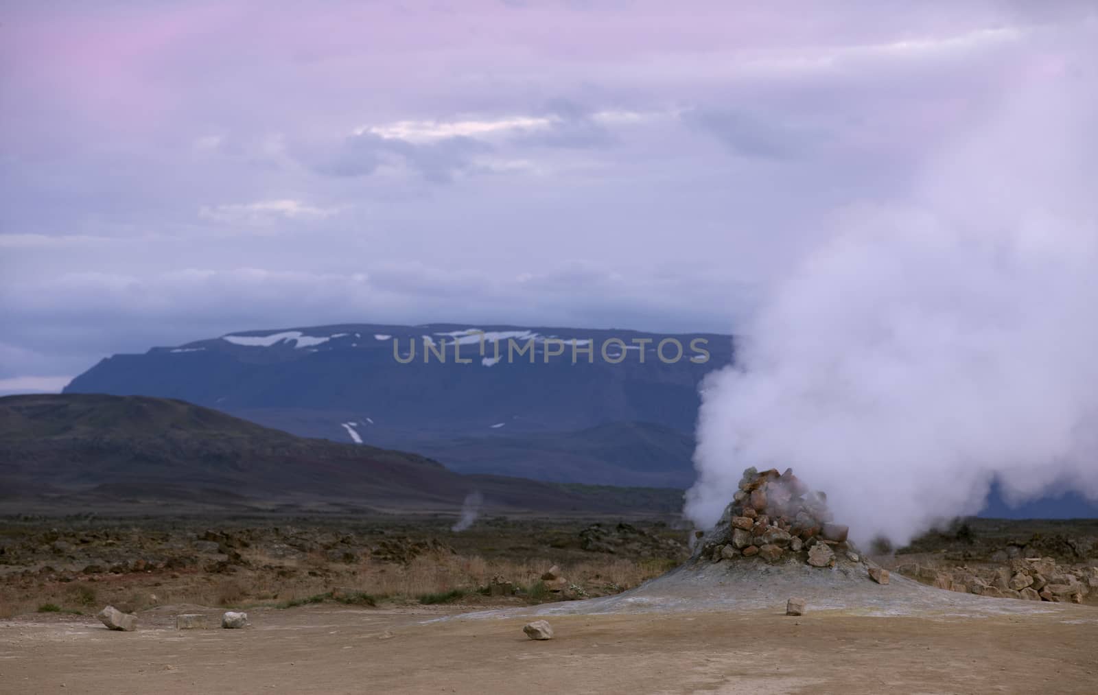 Close up of smoking fumaroles in the geothermal area Hverir, Iceland.