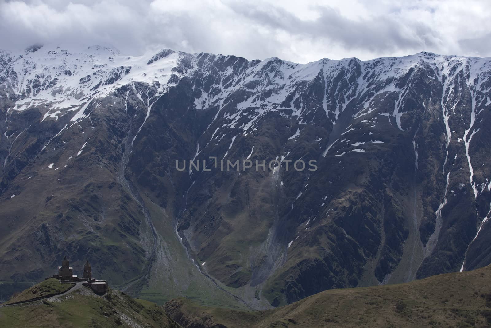 14th century Holy Trinity Church (Tsminda Sameba) near Mount Kazbek in Georgia