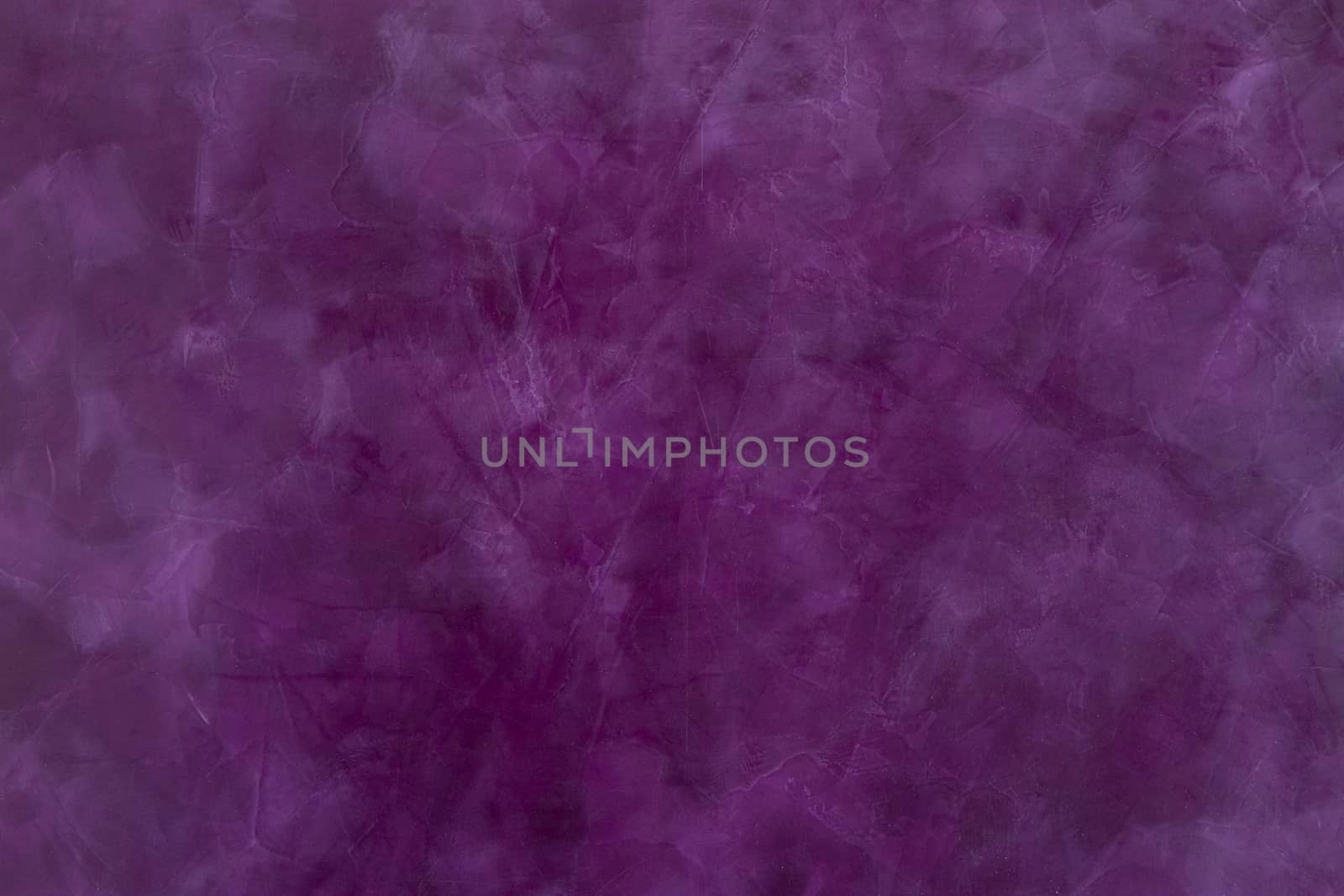 texture  of the painted  stone  wall , purple color with brush strokes, covered with Venetian putty