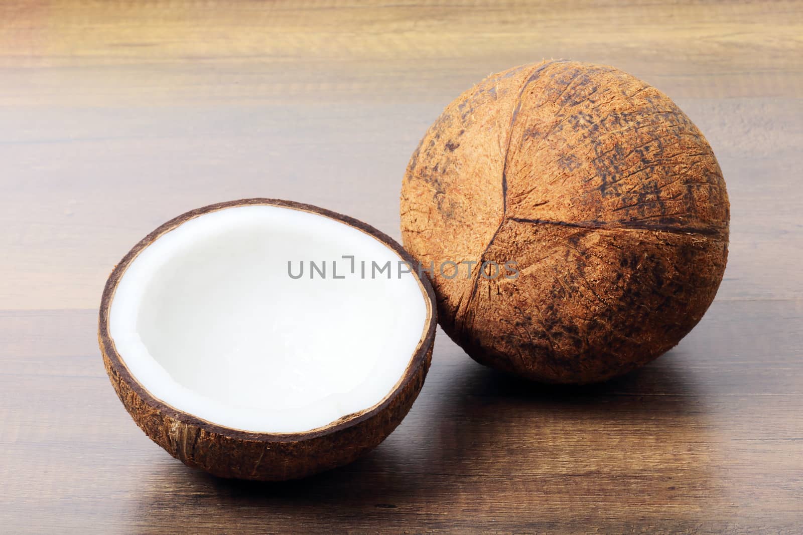 Group of fresh coconuts on wood background. 