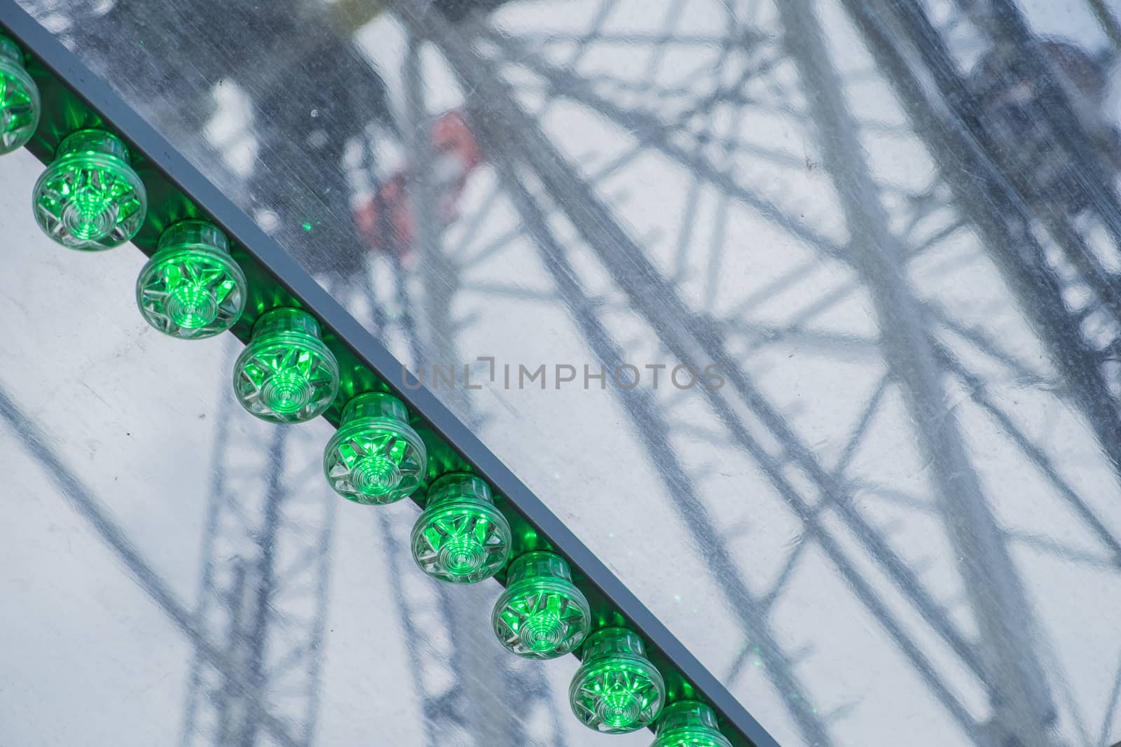 Green lights of a big wheel by w20er