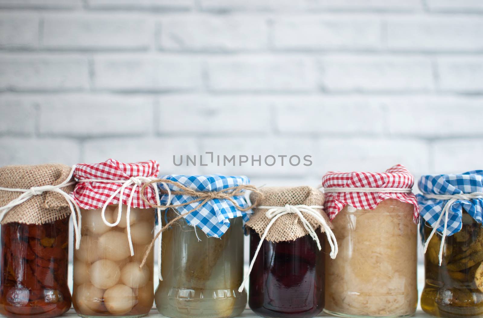 Fermented vegetables background by unikpix