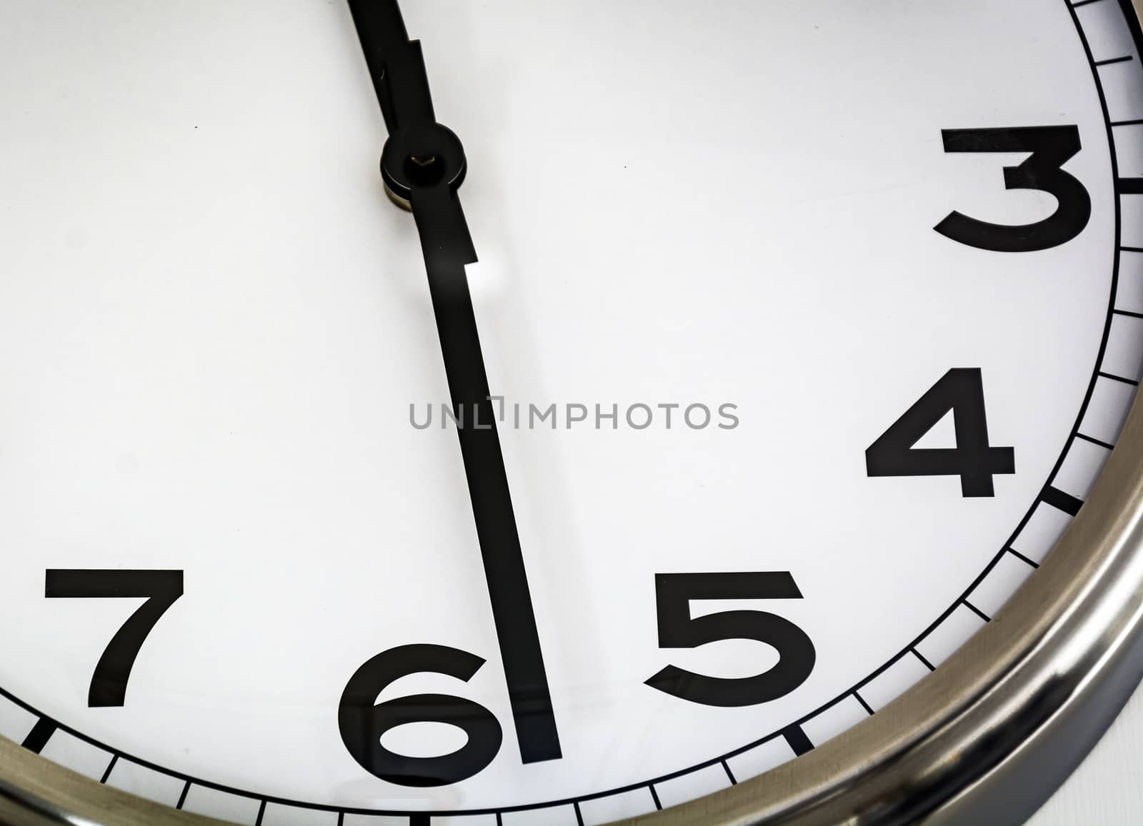 Close-up view of an white analog watch