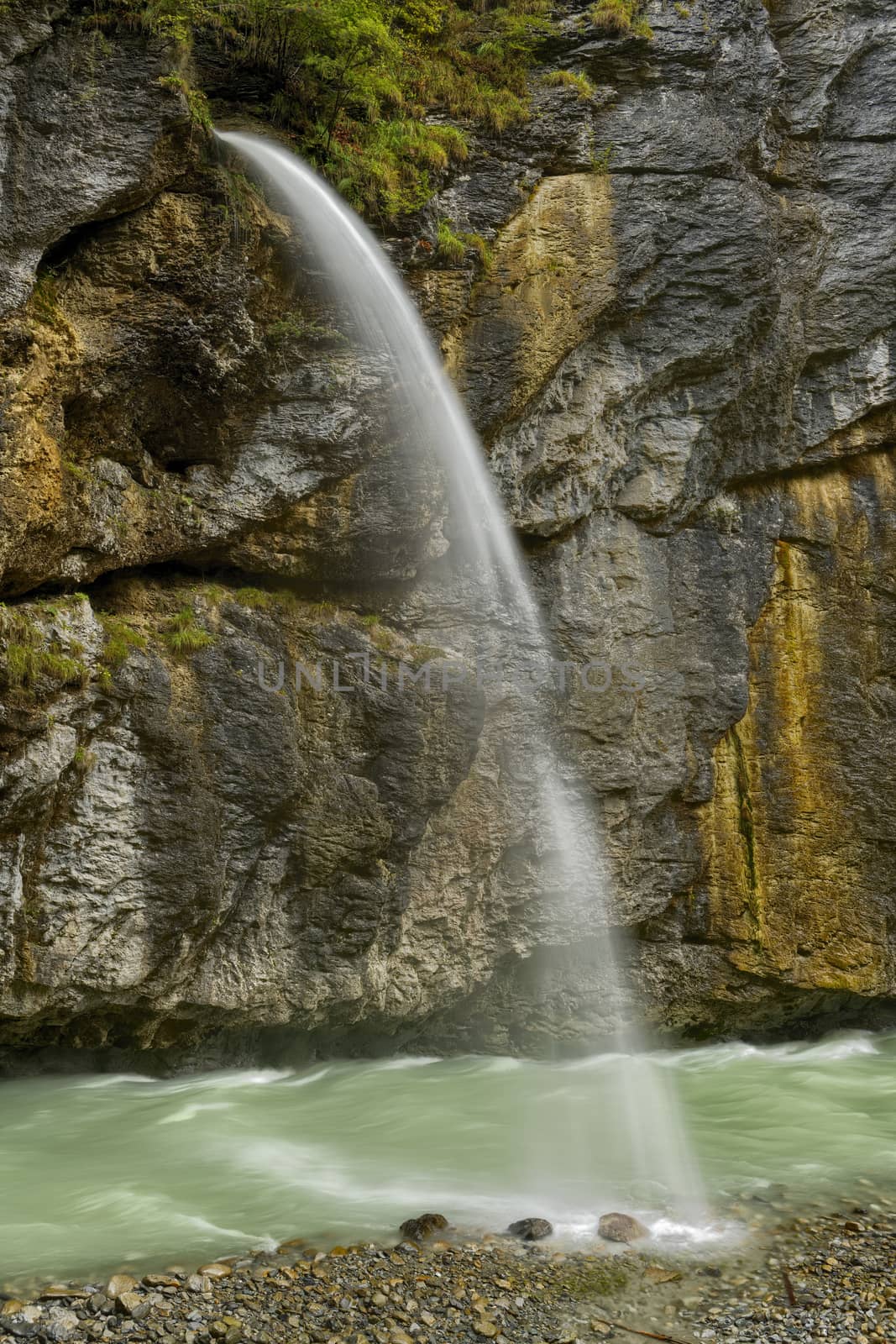 Beautiful waterfall in the Aare Canyon between Meiringen and Innertkirchen, Bernese Alps, Switzerland