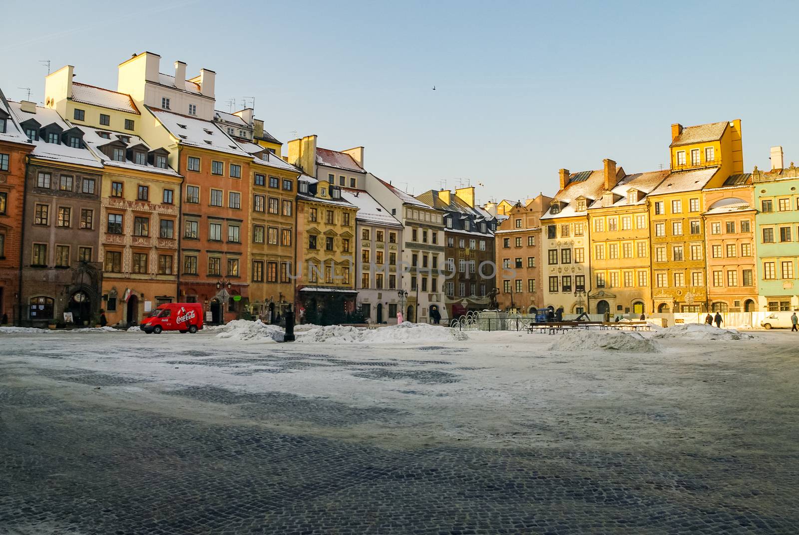 Warsaw, Poland -January 5, 2011: Houses in old town market square, Warsaw, Poland. Winter time with snow